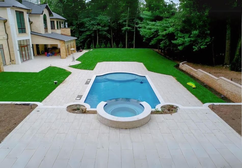How Porcelain Pavers Can Enhance Your Pool Area