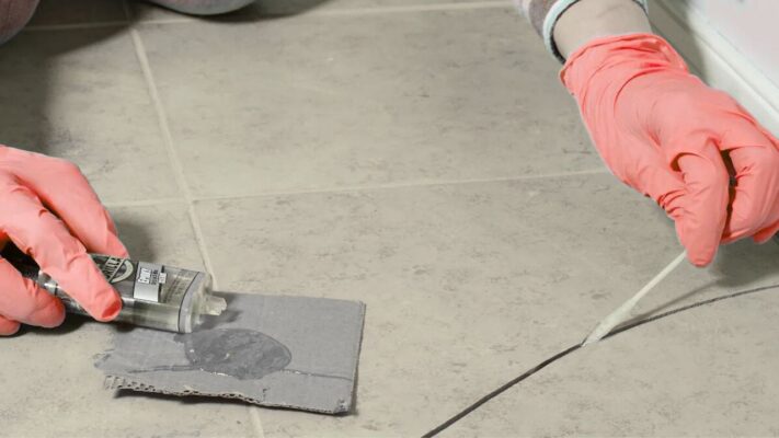 How to Fix Cracked Porcelain Tiles and Pavers: Easy DIY Repair Guide Filling porcelain tile crack with color-matched epoxy