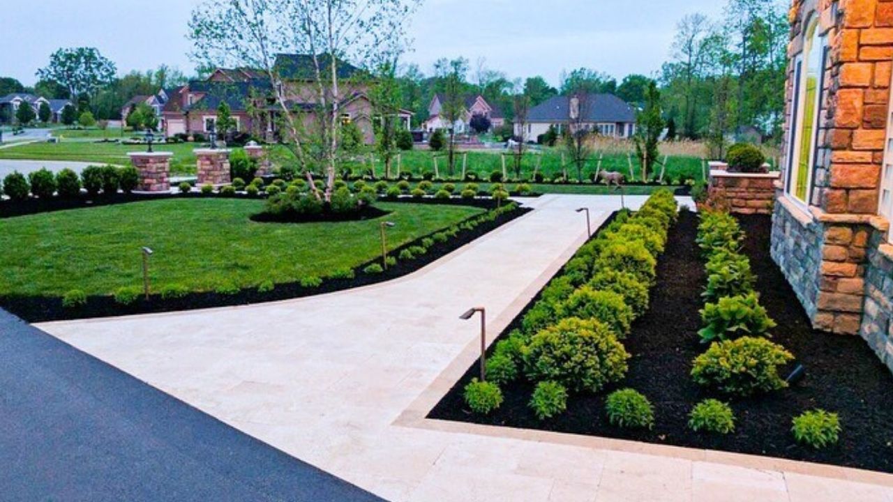 Curved Front Entry with Stone Pavers and Copings