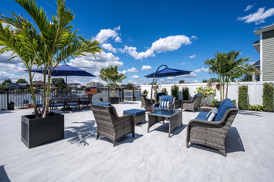 How to Clean Porcelain Pavers (No Chemicals) White 20x40 porcelain pavers paired with Heritage Olive limestone copings