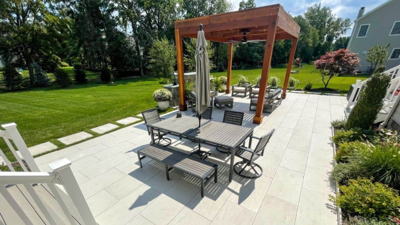 wood pergolas with porcelain paver patios