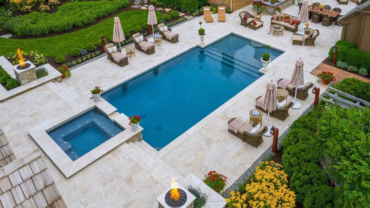 12 Outdoor Living Area Ideas Using Stone & Porcelain Pavers Luxury resort-style poolside retreat with travertine pavers for Best Outdoor living area ideas.
