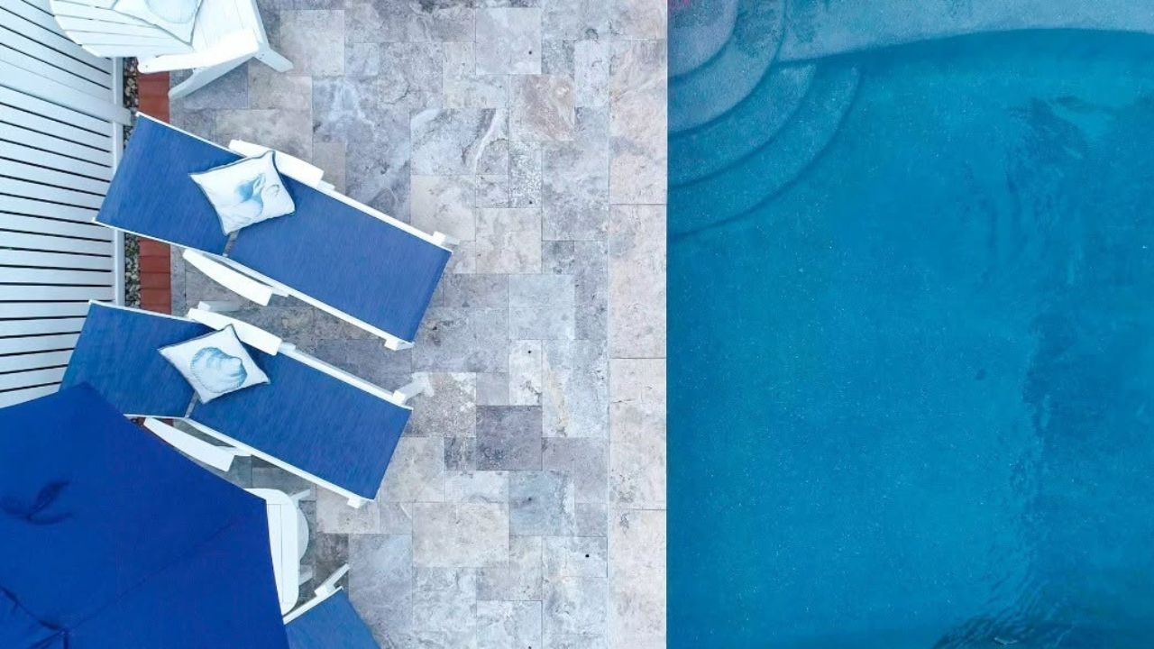 9 Pool Surround Ideas Using Porcelain & Natural Stone Pavers Pool Surround Ideas Using French Pattern Travertine Pavers