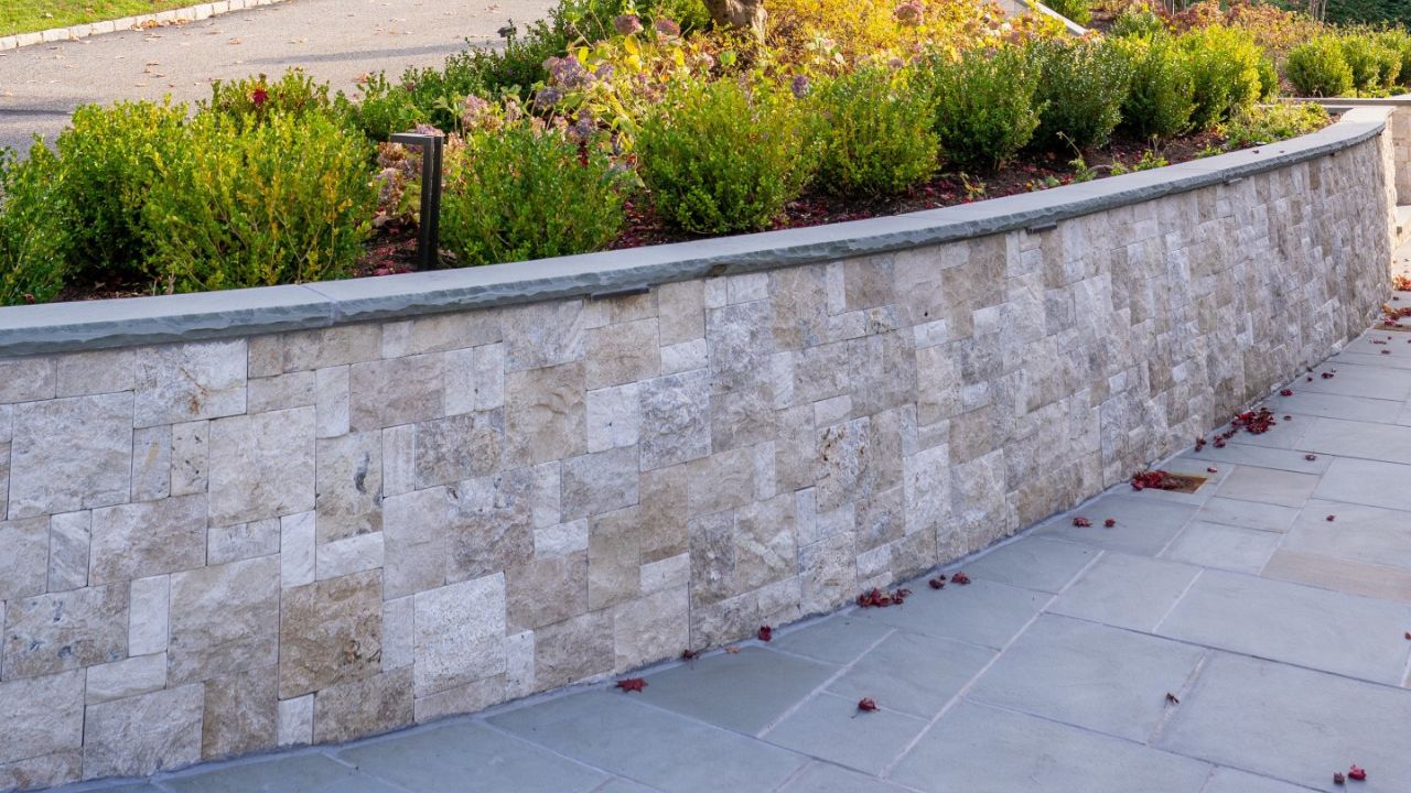 Add Movement with Curved Travertine Retaining Walls Ideas
