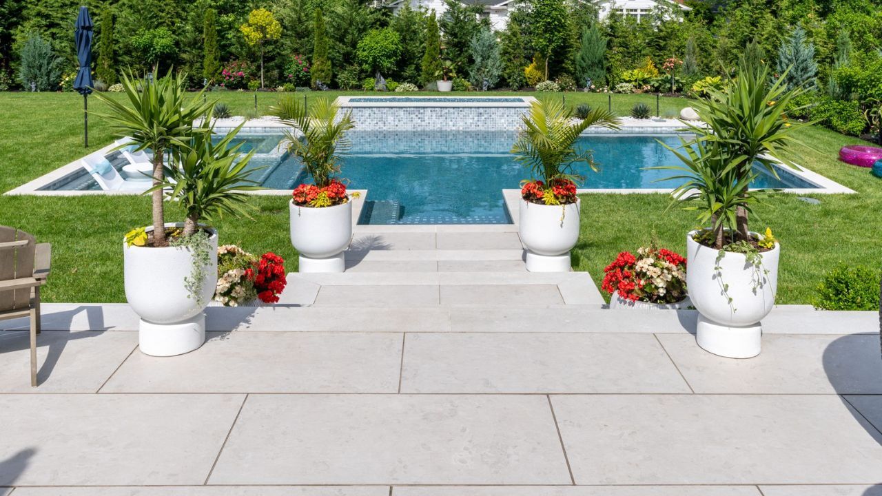 10 Large Format Paver Designs That Make Small Spaces Look Bigger Continuous Floor from Indoors to Outdoors Using Large Porcelain Paver Outdoor