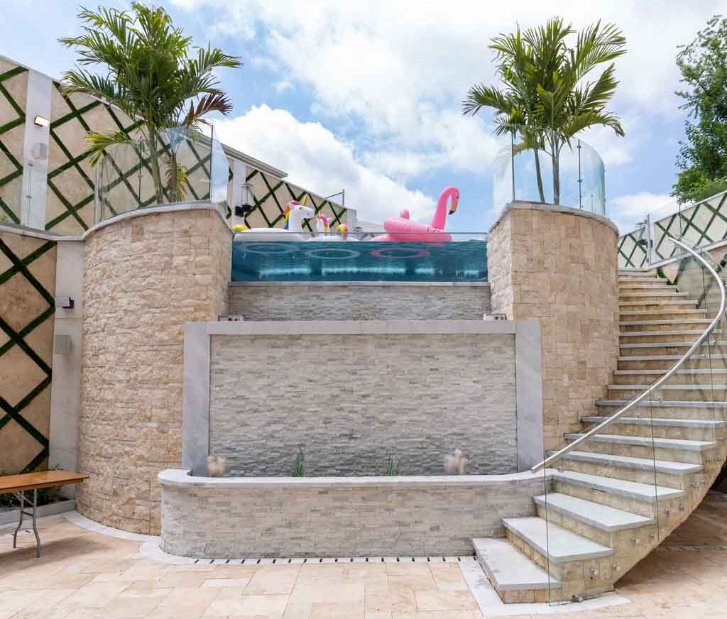 Mix Retaining Wall Materials using Ivory Travertine and Afyon Ice Marble for a Custom Look