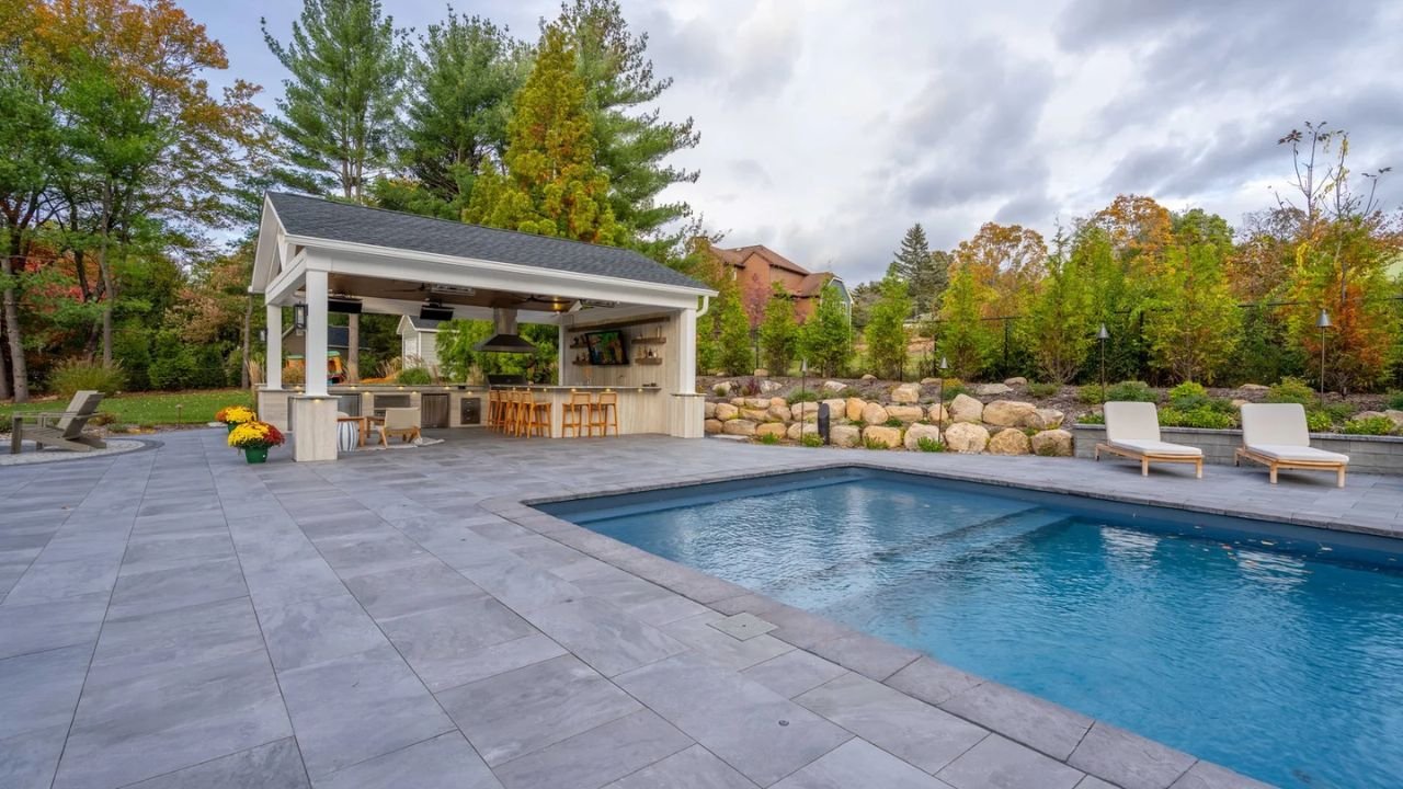 Metal Porcelain Pavers in Mini Modular Pattern used around a residential pool and outdoor living area